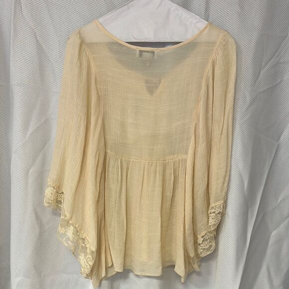 Cream Bell Sleeve Blouse with Tie Front and Asymmetrical Design - Picture 3 of 4